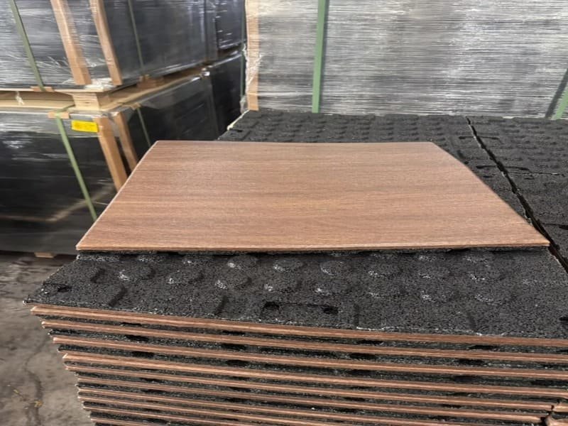 installer cutting rubber flooring